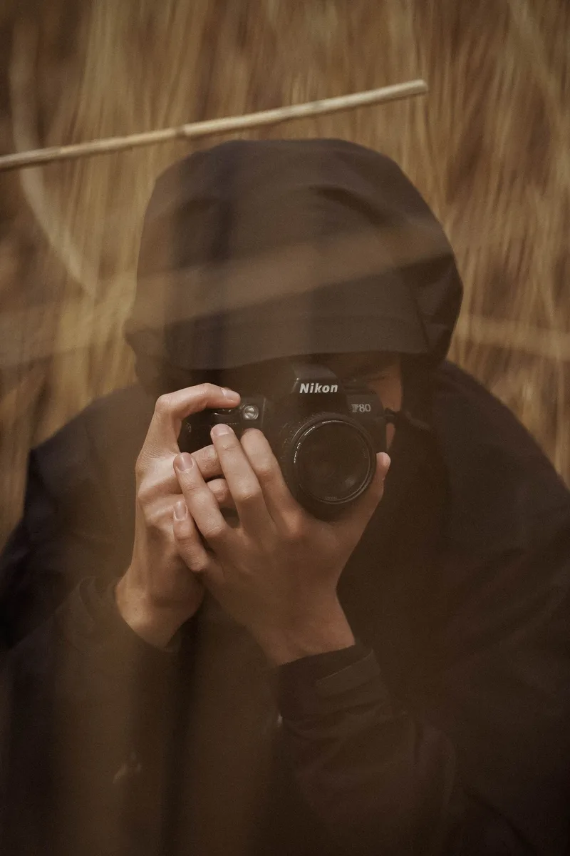 Fotograf mit Kamera im Einsatz